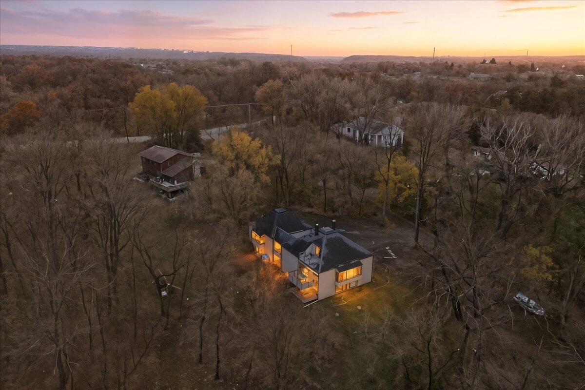 Luxury estate on Coventry Lane at twilight, aerial view